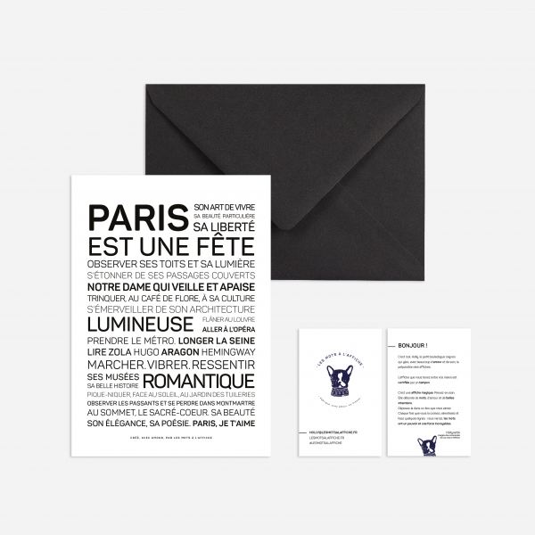 Une enveloppe noire avec le mot Paris dessus.