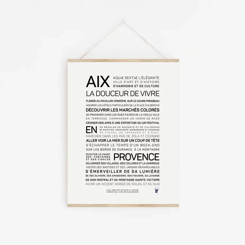 Affiche minimaliste "Aix en provence" avec un texte français élégant sur le charme de la ville, en caractères gras et réguliers sur fond blanc, suspendu par une ficelle - une idée cadeau parfaite pour les amoureux de la Provence.