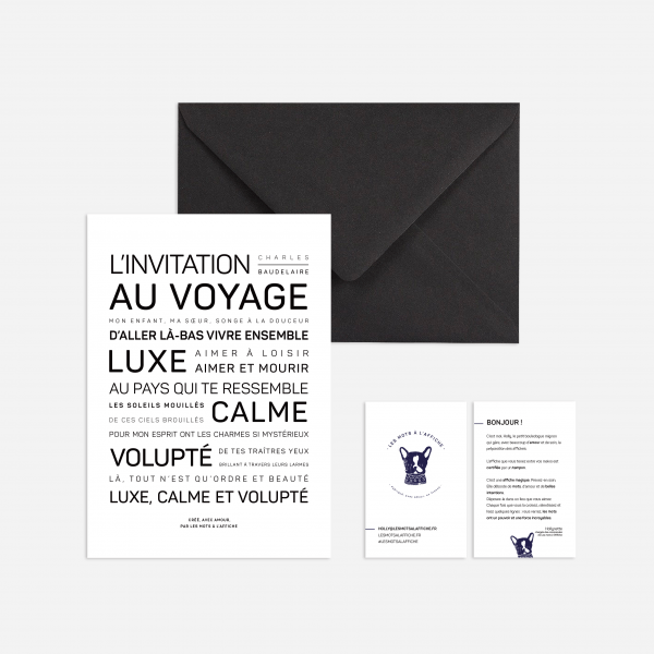 Une enveloppe noire Luxe, calme et volupté et un papier cadeau blanc.