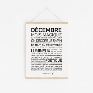 Une affiche en noir et blanc avec les mots "Décembre" et "cadeau".