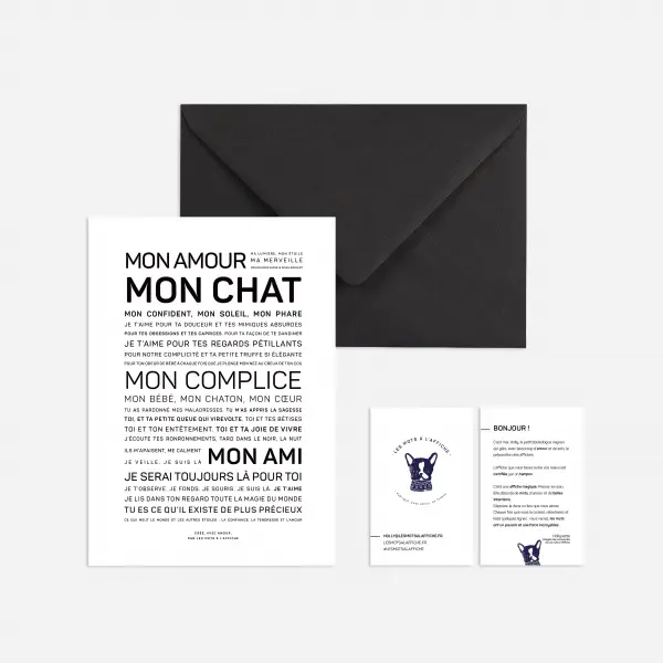 Une enveloppe noire avec les mots mon chien dessus, contenant un cadeau.