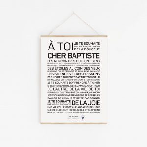 Une affiche en noir et blanc avec les mots un jouet cher Baptiste.
