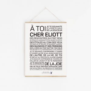 Une affiche en noir et blanc avec la mention "a toi cher Eliott", un Eliott parfait.