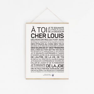 Une affiche en noir et blanc avec la mention "à toi cher Louis", un Louis parfait.