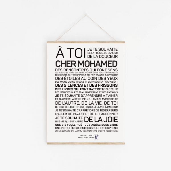 Une affiche en noir et blanc avec les mots « a toi cher Mohamed », un Mohamed pensif.