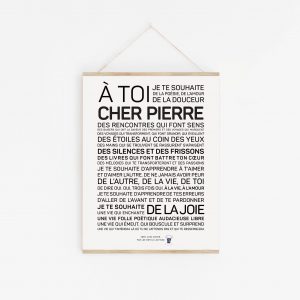 Une affiche en noir et blanc avec la mention « à toi cher Pierre, un cadeau.