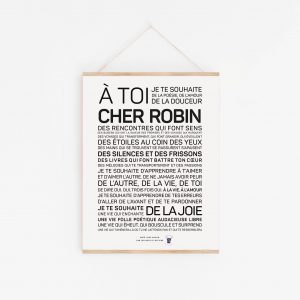 Une affiche en noir et blanc avec les mots "à toi cher Robin" comme cadeau spécial.