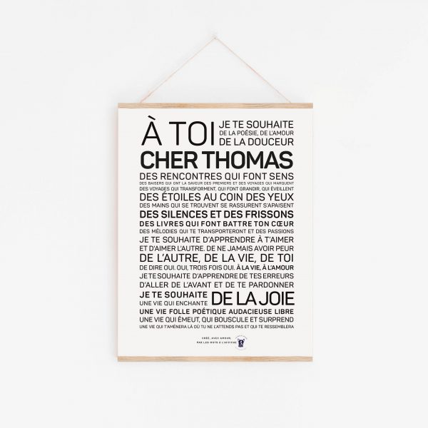Une affiche en noir et blanc avec la mention « a toi de cher Thomas, un cadeau.