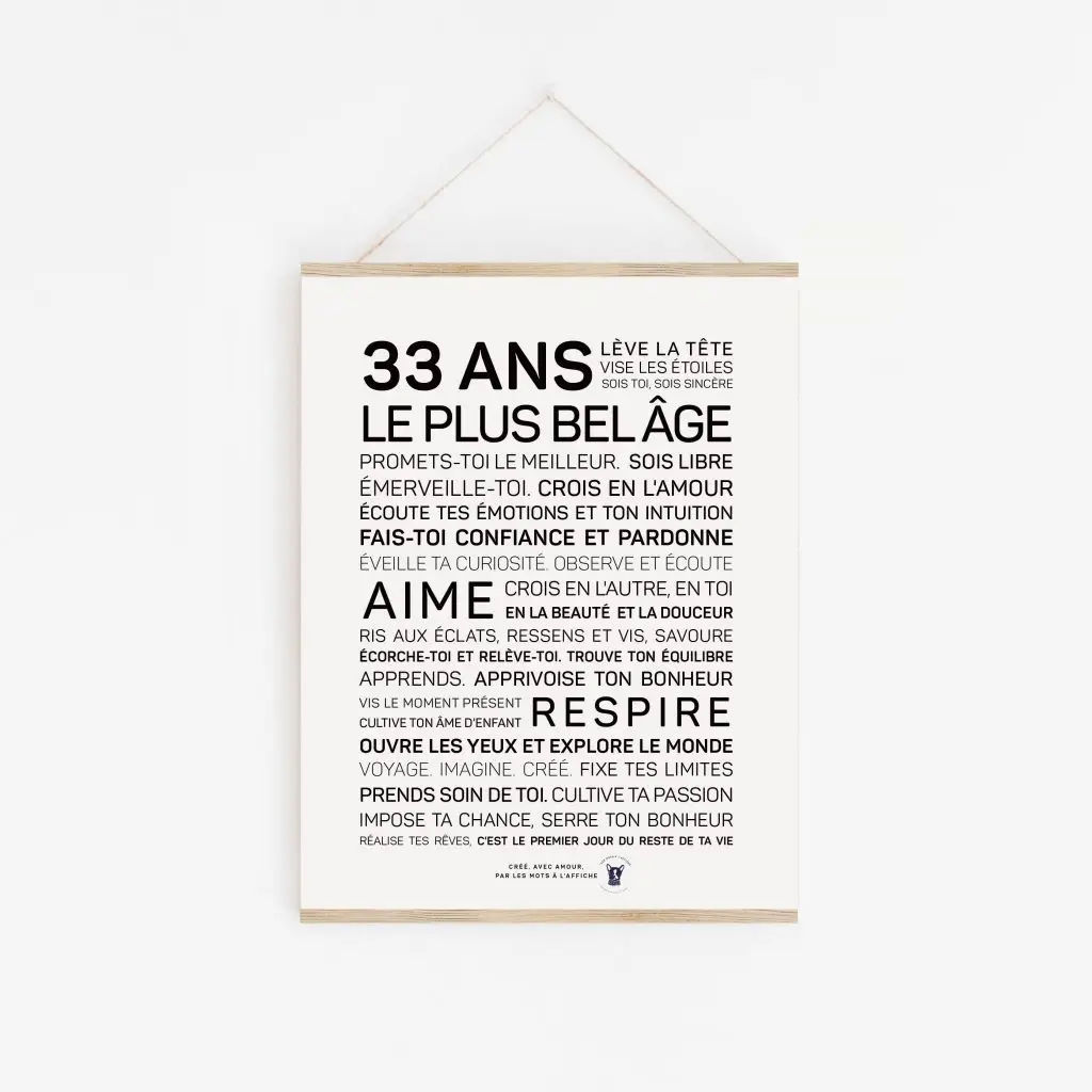 Une affiche 33 ans en noir et blanc avec les mots plus belle.