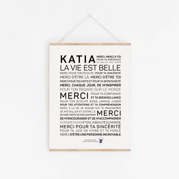 Une affiche en noir et blanc avec les mots "Katia, merci (tutoiement)", une idée de cadeau.