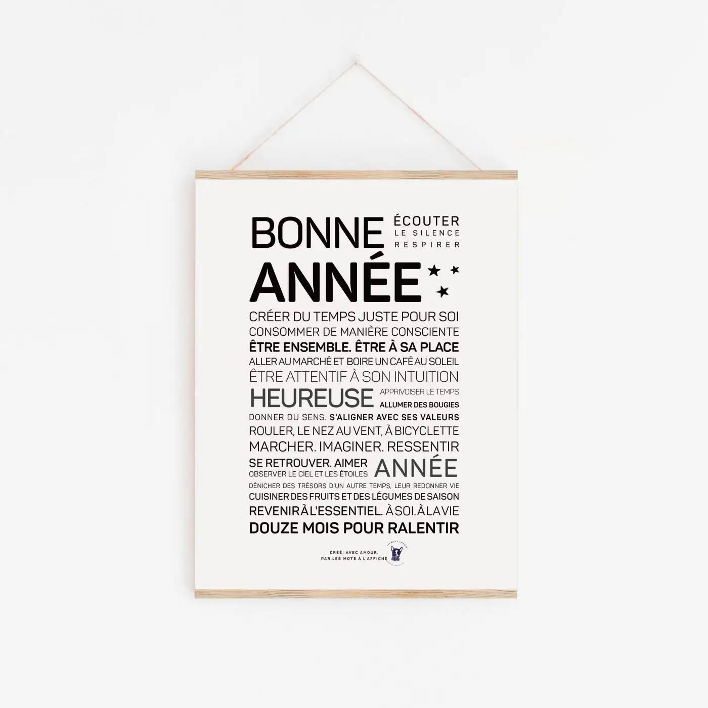 Une affiche en noir et blanc avec la mention « bonne année », une idée cadeau.