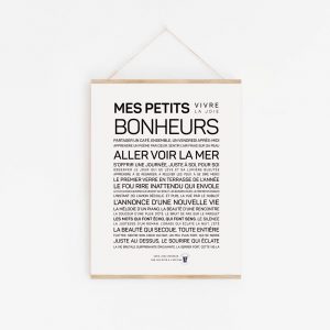 Une affiche en noir et blanc avec les mots "Mes petits bonheurs" en guise de cadeau poétique.