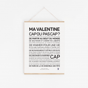Une affiche avec la mention "Ma Valentine, cap ou pas cap ?" en noir et blanc, une idée cadeau inspirante.