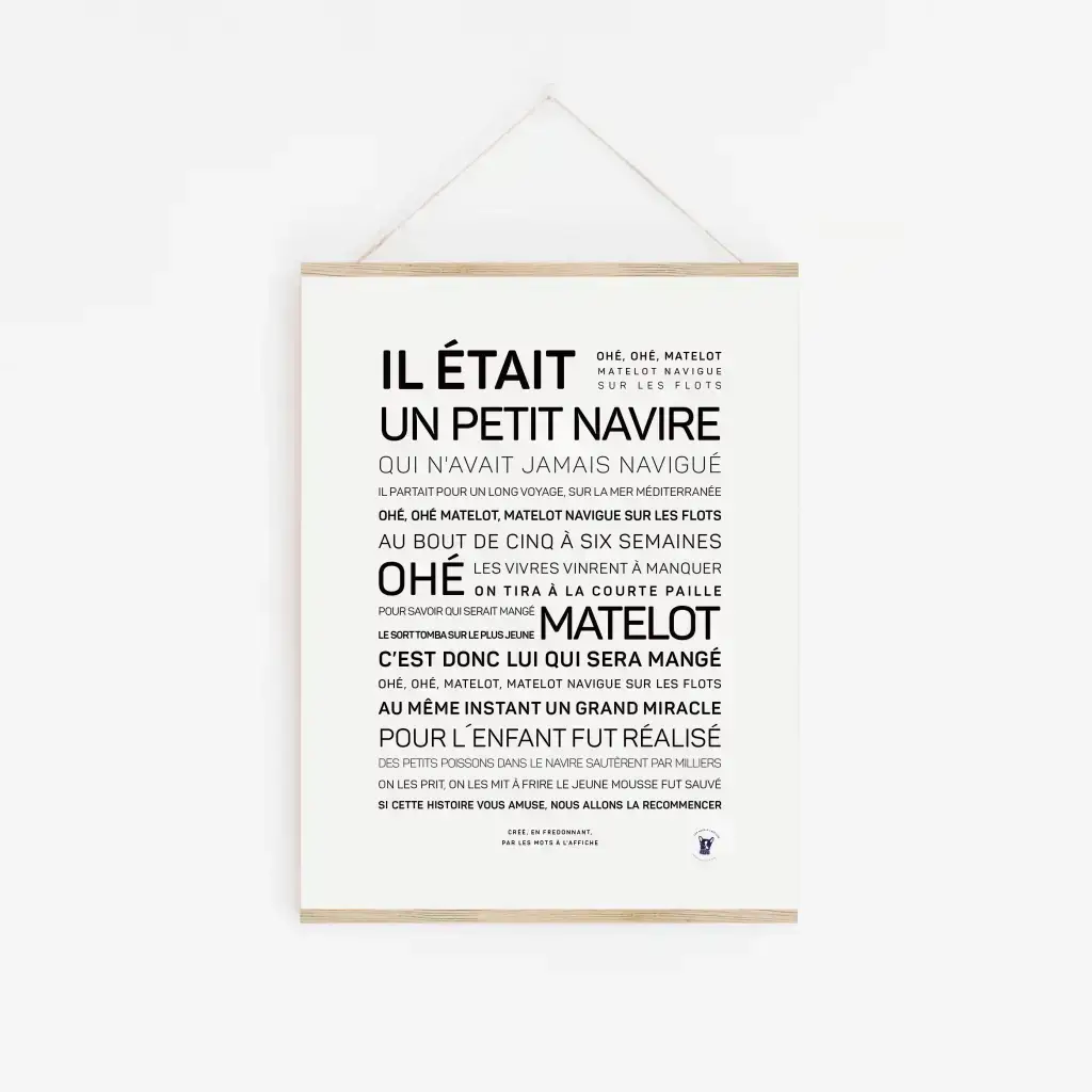 L'affiche « Il était un petit navire » présente les paroles françaises en noir sur fond blanc, suspendues par une ficelle - une excellente idée cadeau pour les amateurs de chansons françaises.