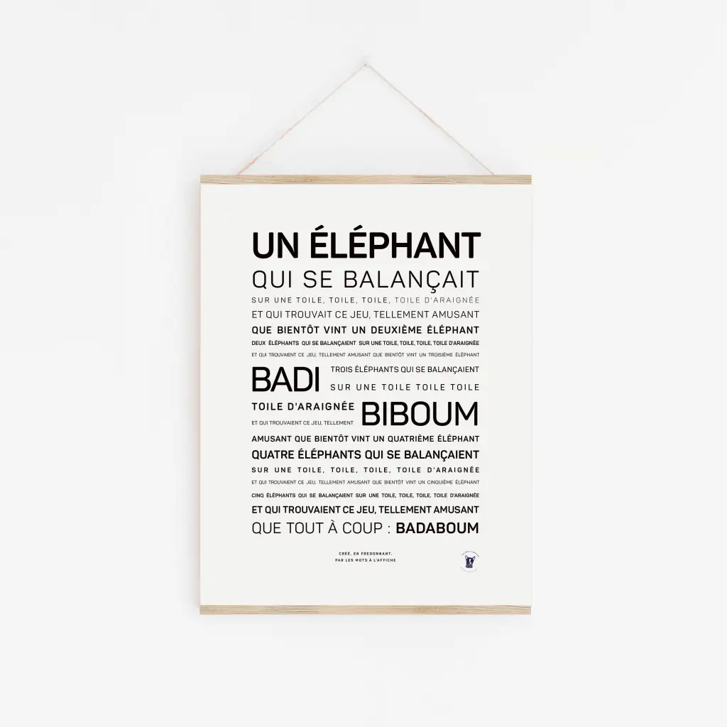 Une affiche encadrée « Un éléphant qui se balançait » présente ses paroles en noir sur blanc, suspendues par une ficelle - une affiche cadeau enchanteresse et le cadeau à thème français parfait pour la chambre de n'importe quel enfant.