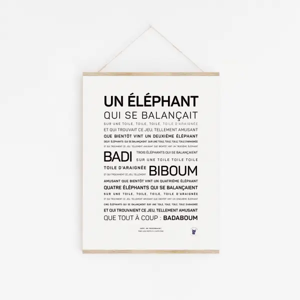 Une affiche encadrée « Un éléphant qui se balançait » présente ses paroles en noir sur blanc, suspendues par une ficelle - une affiche cadeau enchanteresse et le cadeau à thème français parfait pour la chambre de n'importe quel enfant.
