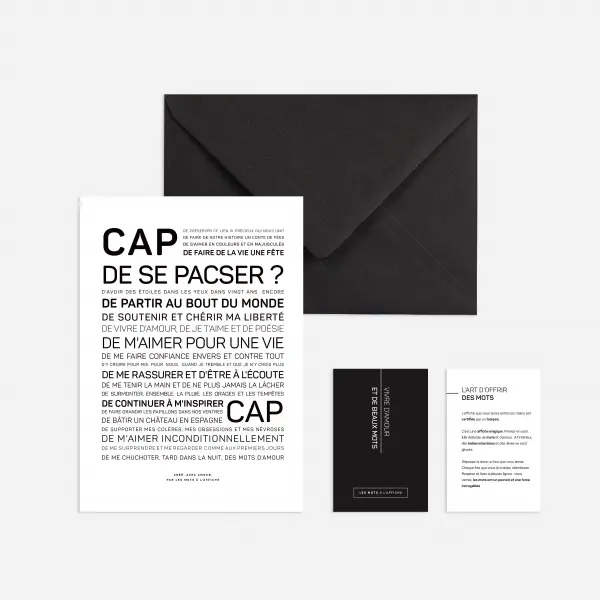 Un ensemble de papeterie chic en noir et blanc, comprenant la grande carte française « Cap de se pacser ? », une enveloppe noire et deux petites cartes - une idée cadeau élégante ou un présentoir cadeau élégant pour toute occasion.