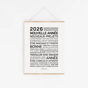 Un panneau blanc avec un texte noir indiquant "2025, nouveaux projets".