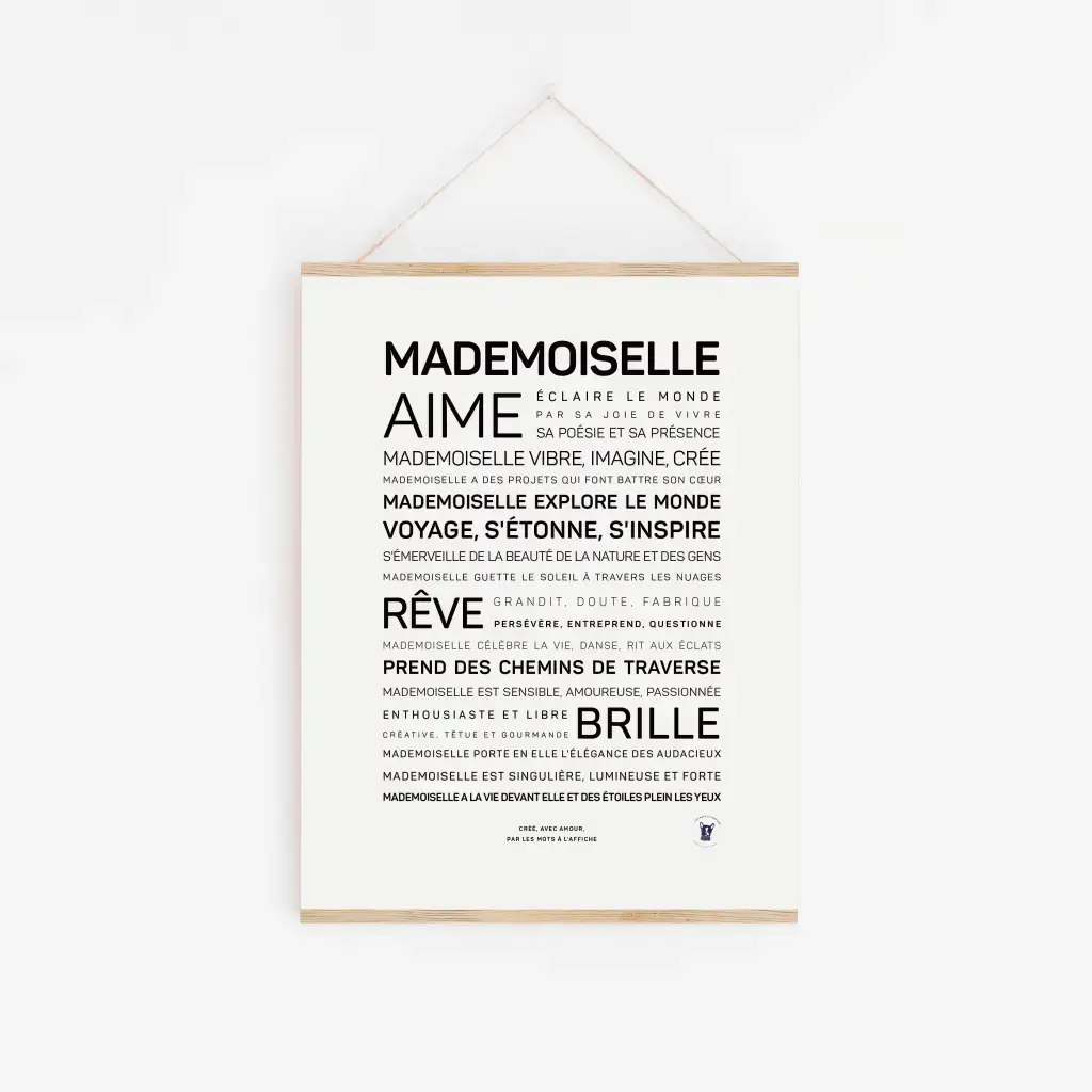 L'affiche « Madame » présente des mots français comme « aime », « explore », « rêve » et « brille » en texte noir et polices assorties, accrochés sur un mur blanc - une idée cadeau parfaite pour inspirer la positivité au quotidien.