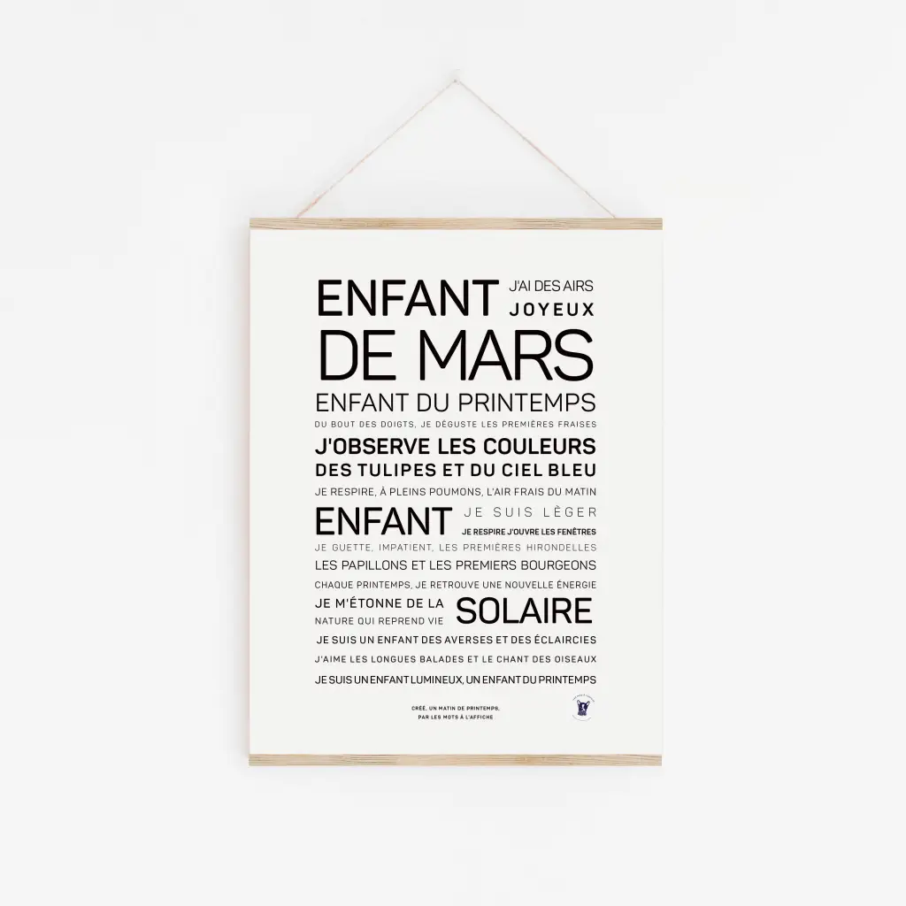 Enfant de mars est une impression murale minimaliste présentant un texte français sur les enfants nés en mars, élégamment accroché par une fine ficelle - une idée de cadeau d'anniversaire élégante.