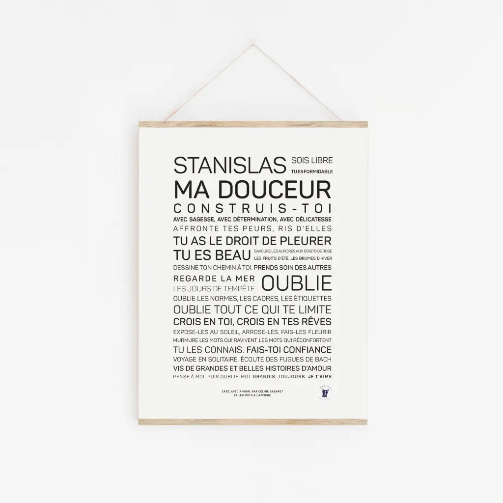 Une affiche blanche intitulée « Stanislas, ma douceur » affiche des phrases françaises motivantes dans des polices élégantes, accrochées sur un mur blanc par une ficelle - une idée cadeau inspirante pour toute occasion.