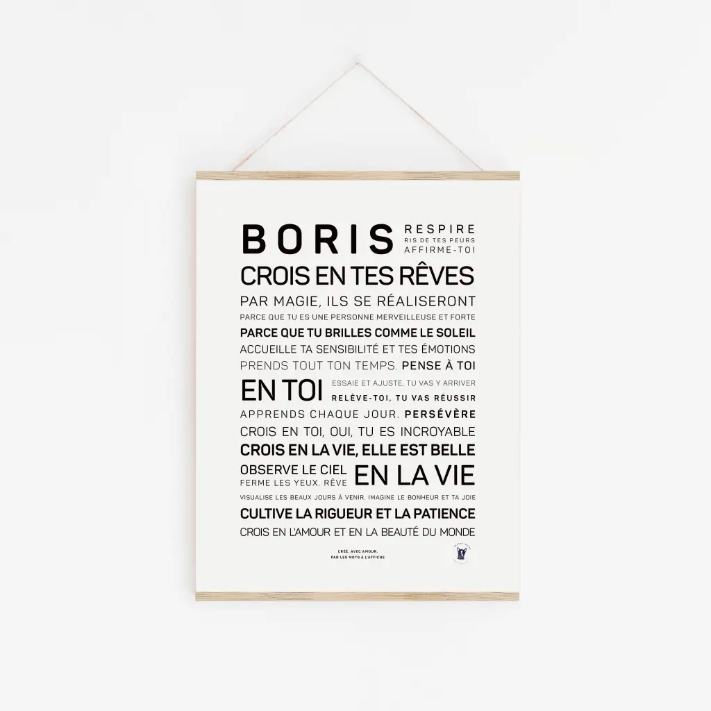 Une affiche minimaliste, « Boris, croise en tes rêves », est accrochée sur un mur blanc avec un texte de motivation en français noir et gras – un cadeau inspirant qui encourage la confiance en soi, les rêves, l'amour et la patience.