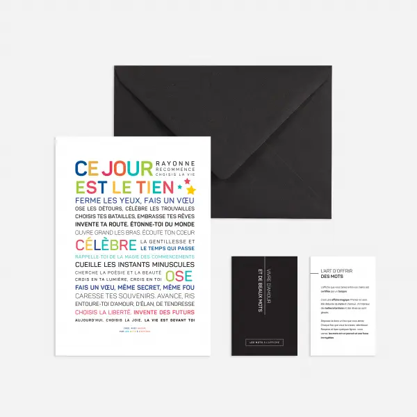 Une carte de vœux intitulée "Ce jour est le tien !" comporte un texte coloré en français, une enveloppe noire et deux petites cartes sur fond blanc. La carte principale contient un message d'inspiration.