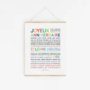 L'affiche "Joyeux anniversaire (couleurs)" est blanche et comporte un texte français en gras et en couleurs. La mention "Joyeux Anniversaire" figure en haut de l'affiche, tandis que des phrases de motivation de différentes couleurs et tailles sont centrées en dessous.